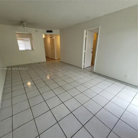 a view of a plants with trees