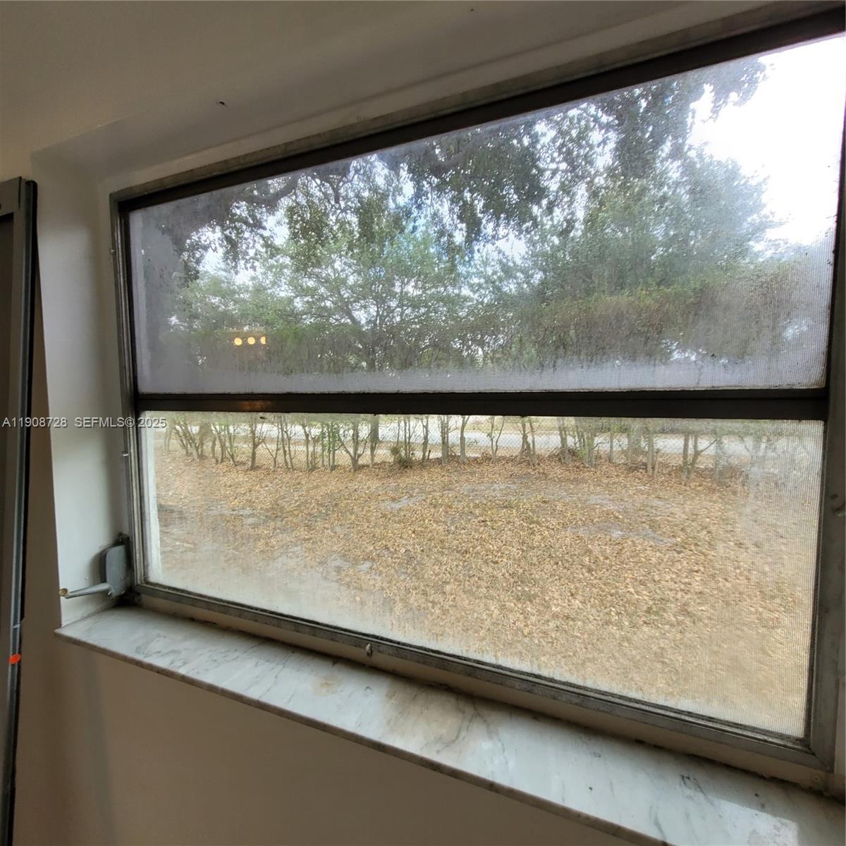 8540 Sherman Circle North, Unit 101 Miramar, FL 33025 - Photo 26 of 36 a view of a window