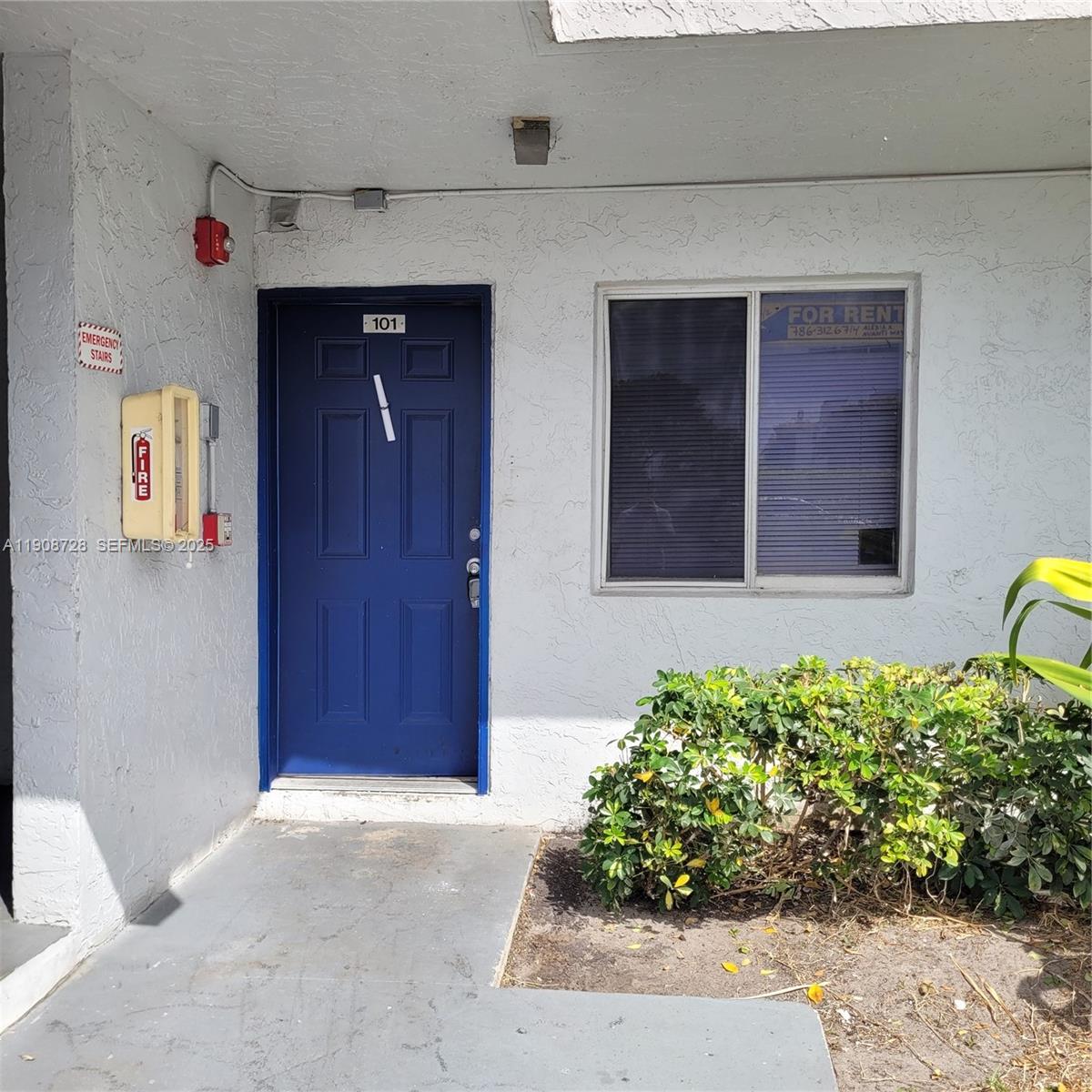 8540 Sherman Circle North, Unit 101 Miramar, FL 33025 - Photo 4 of 36 a front view of a house