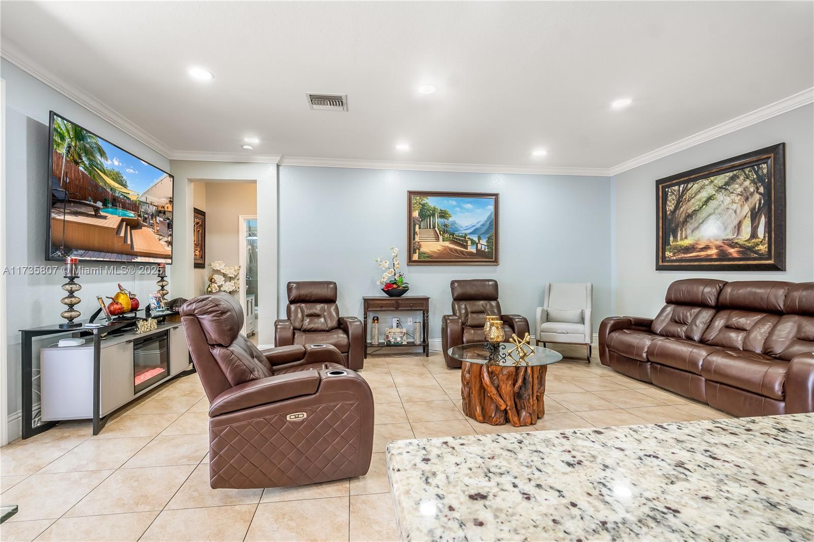 4170 Northeast 20th Street Homestead, FL 33033 - Photo 12 of 52 a living room with furniture kitchen and a couch