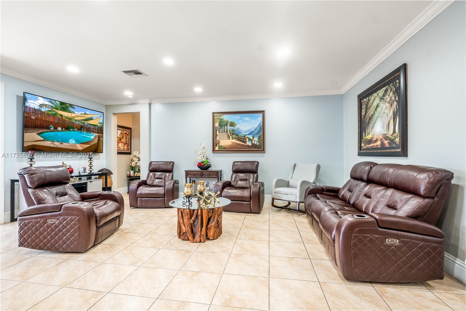 4170 Northeast 20th Street Homestead, FL 33033 - Photo 13 of 52 a living room with furniture and a flat screen tv