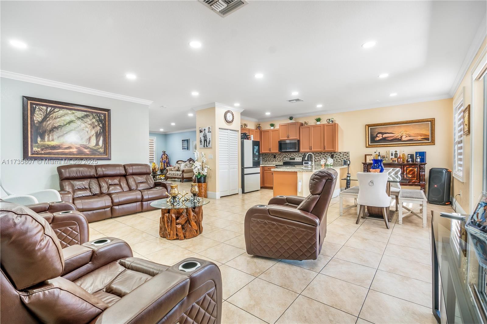 4170 Northeast 20th Street Homestead, FL 33033 - Photo 14 of 52 a living room with furniture and a view of kitchen