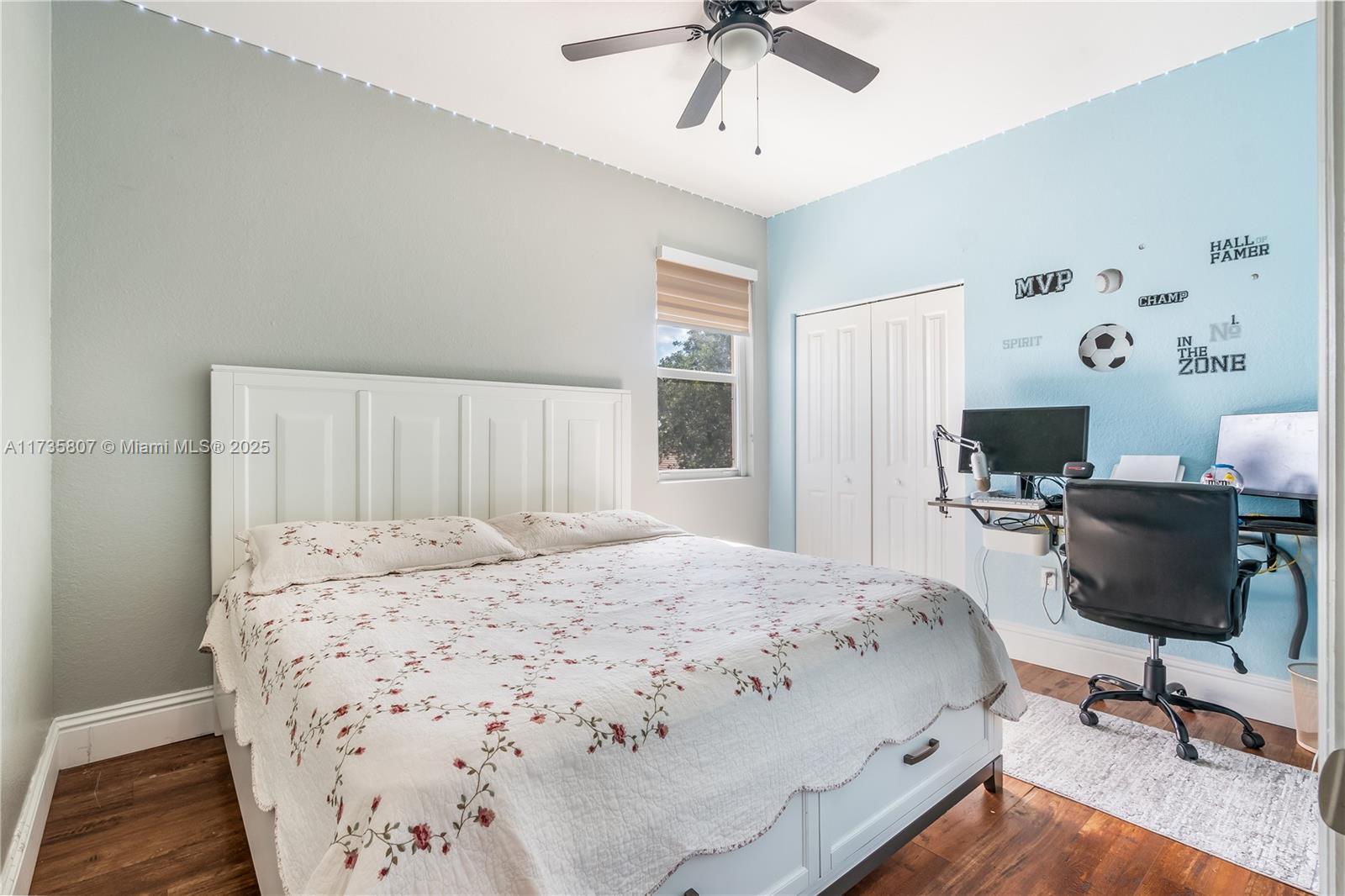 4170 Northeast 20th Street Homestead, FL 33033 - Photo 25 of 52 a bedroom with a bed a chair and potted plant on the dresser