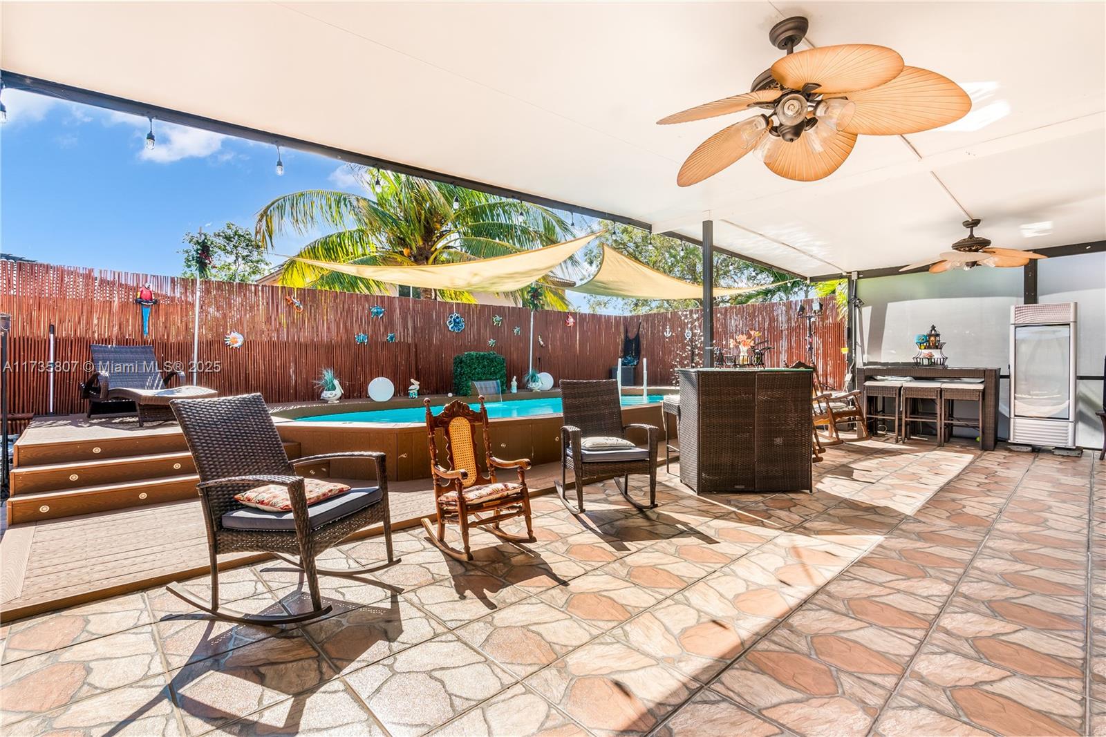 4170 Northeast 20th Street Homestead, FL 33033 - Photo 42 of 52 a view of a chairs and tables in a patio