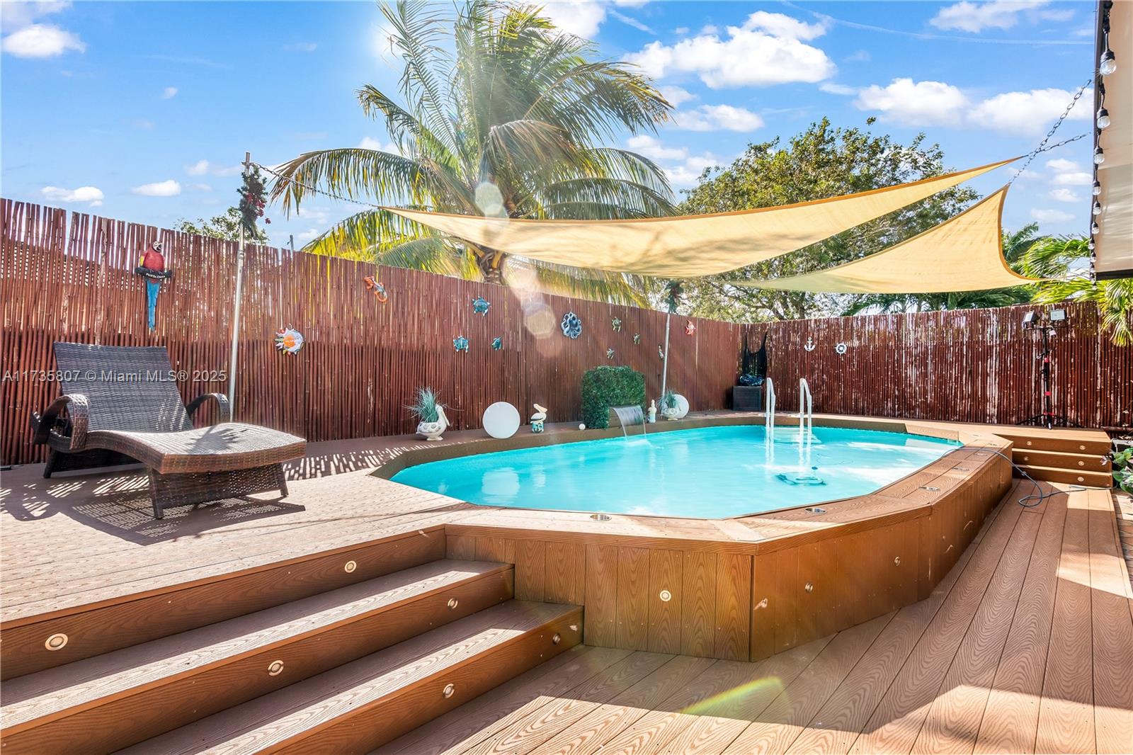 4170 Northeast 20th Street Homestead, FL 33033 - Photo 45 of 52 a view of a backyard with a patio