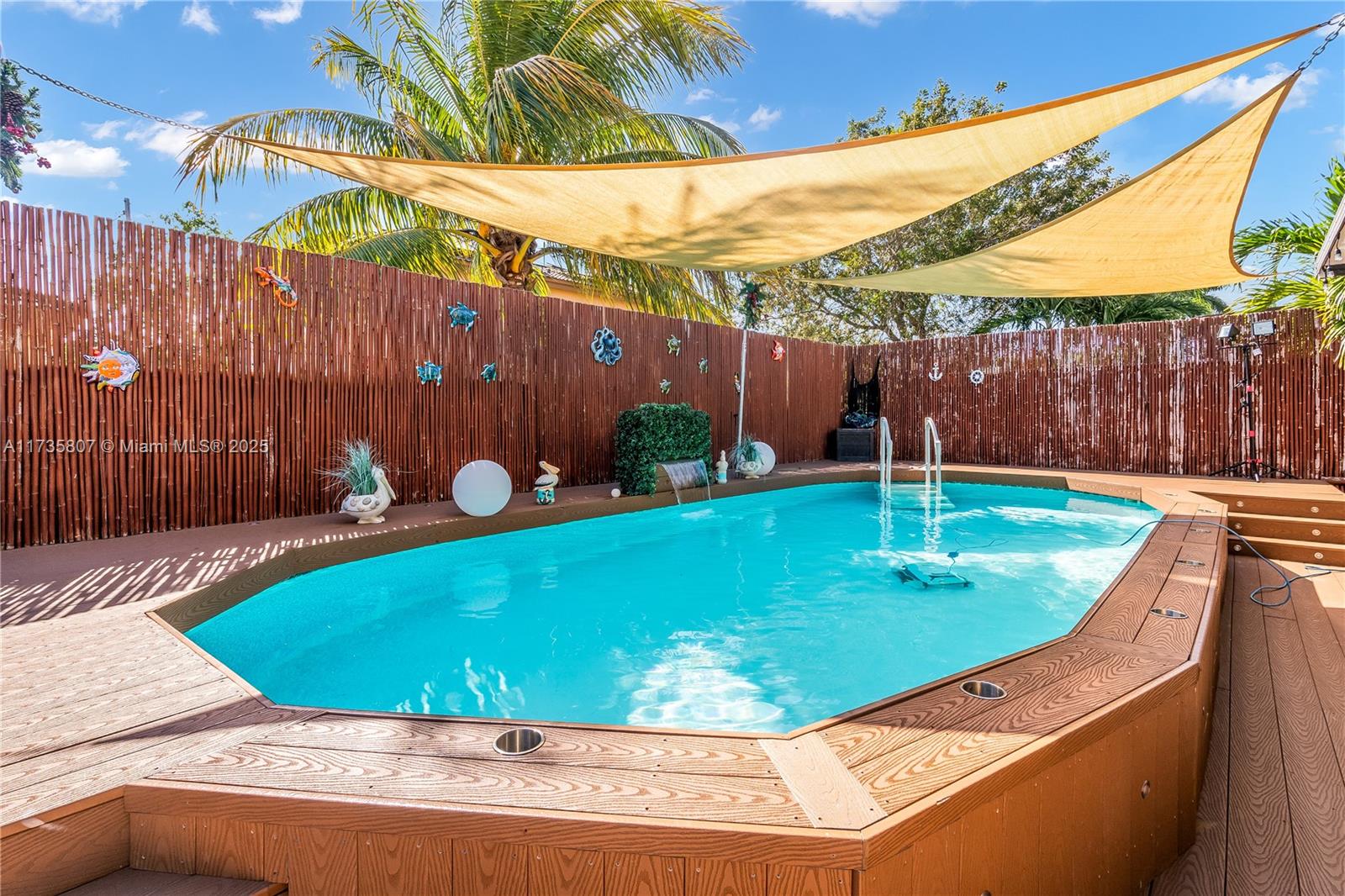 4170 Northeast 20th Street Homestead, FL 33033 - Photo 46 of 52 a view of a backyard with swimming pool