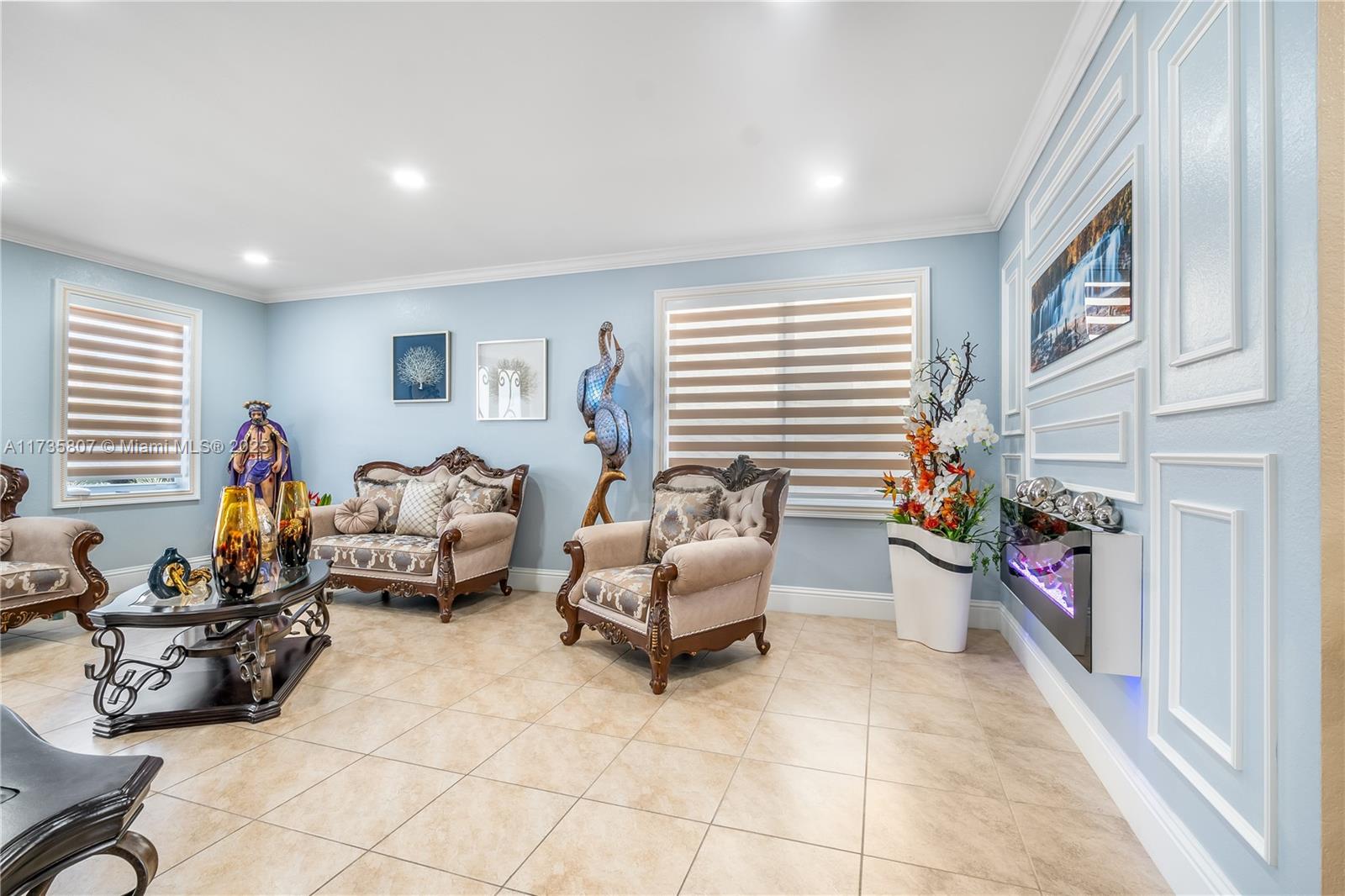4170 Northeast 20th Street Homestead, FL 33033 - Photo 5 of 52 a living room with furniture toys and a window