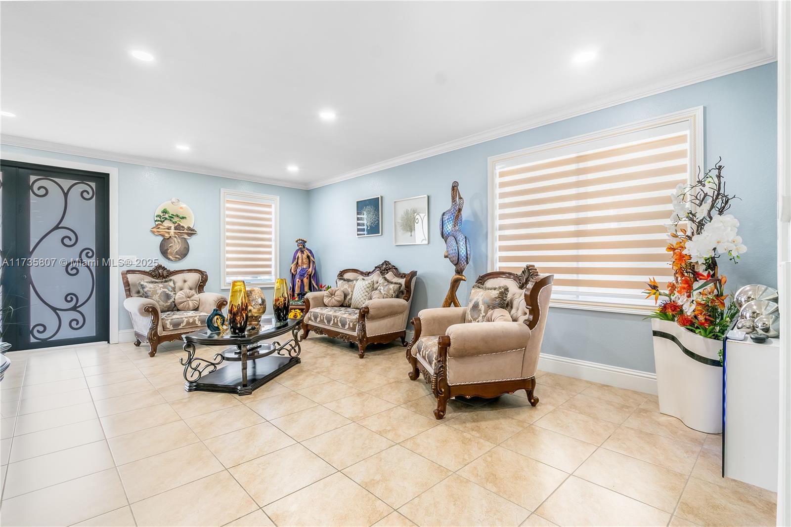 4170 Northeast 20th Street Homestead, FL 33033 - Photo 6 of 52 a living room with furniture and flower plants