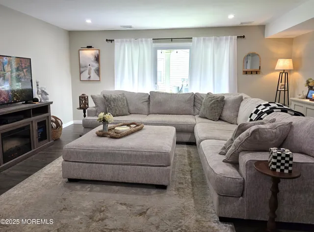 a bathroom with a sink toilet and a mirror