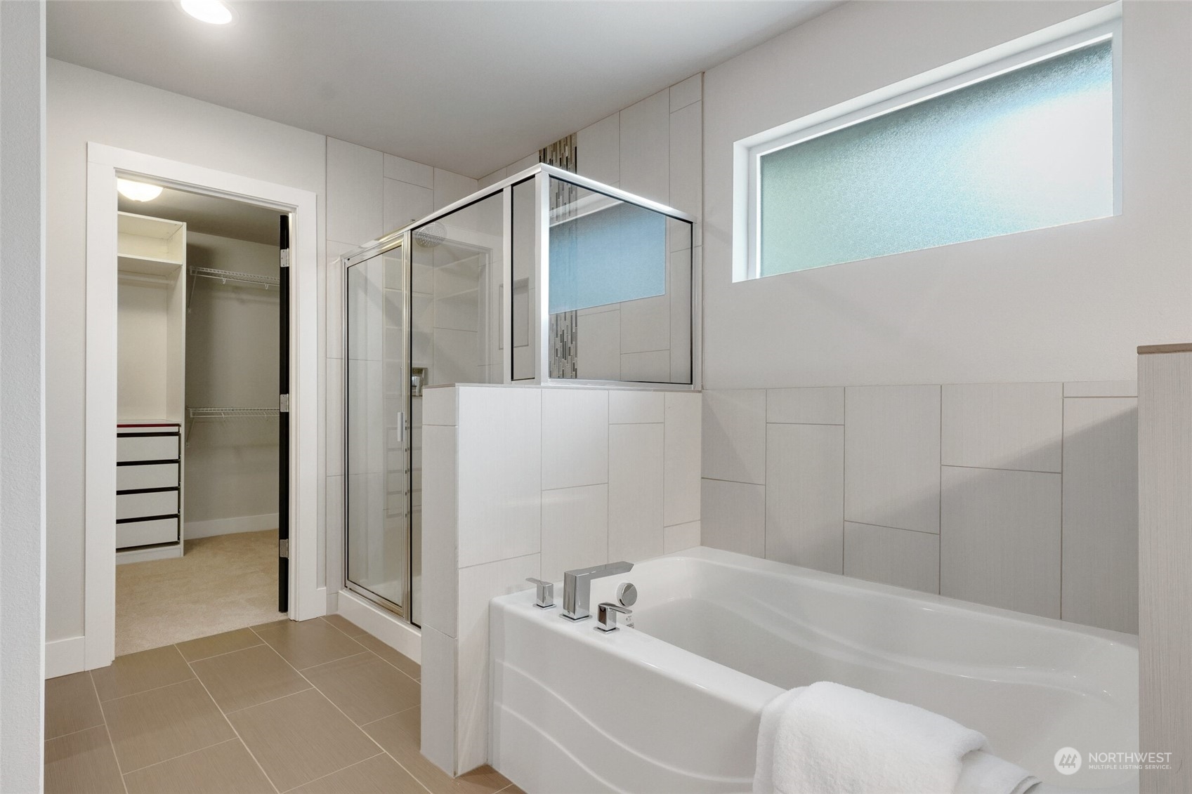 1907 240th Place Southwest Bothell, WA 98021 - Photo 17 of 28 a bathroom with a bathtub and a shower
