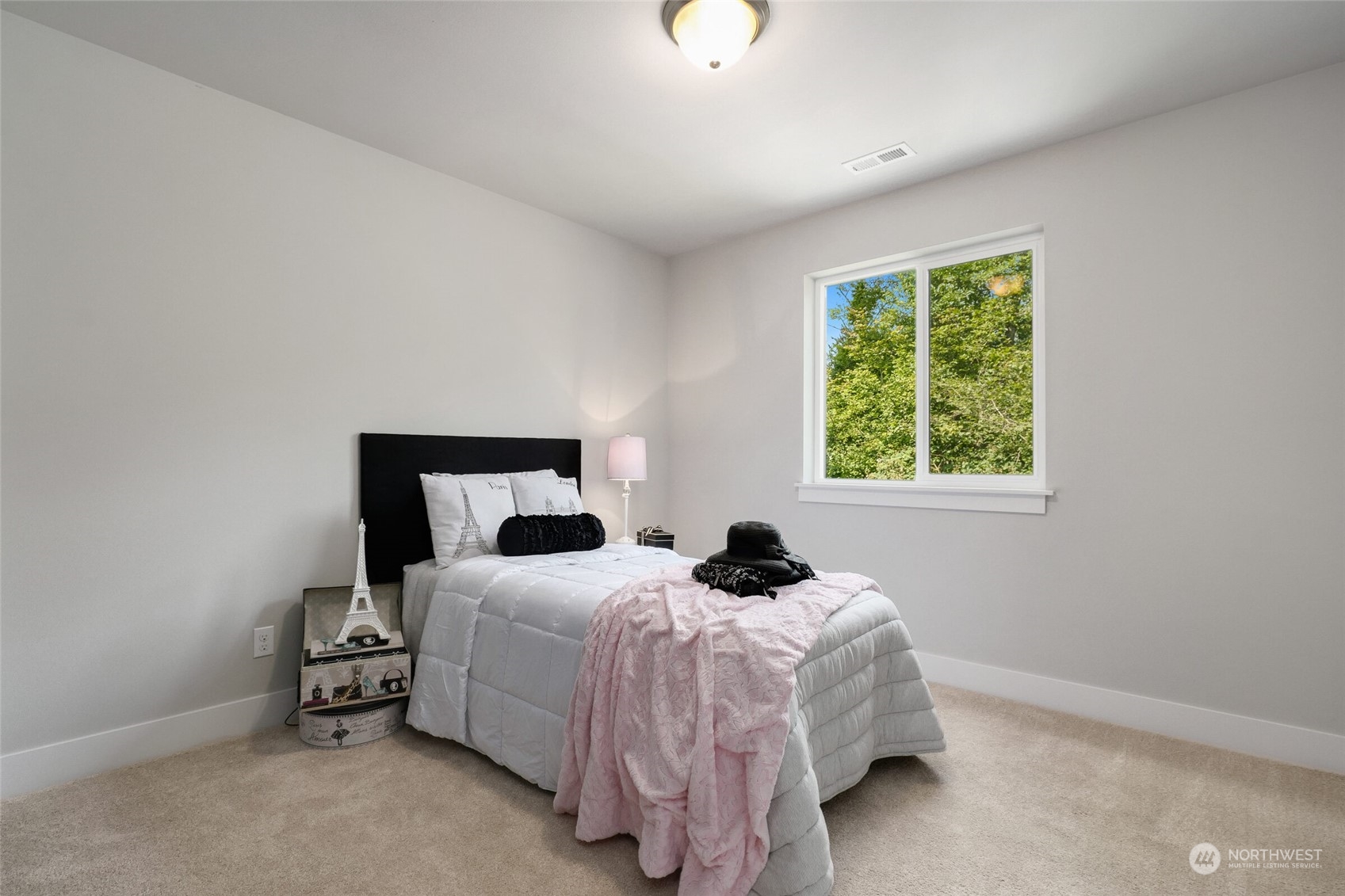 1907 240th Place Southwest Bothell, WA 98021 - Photo 23 of 28 a bedroom with a bed and a window