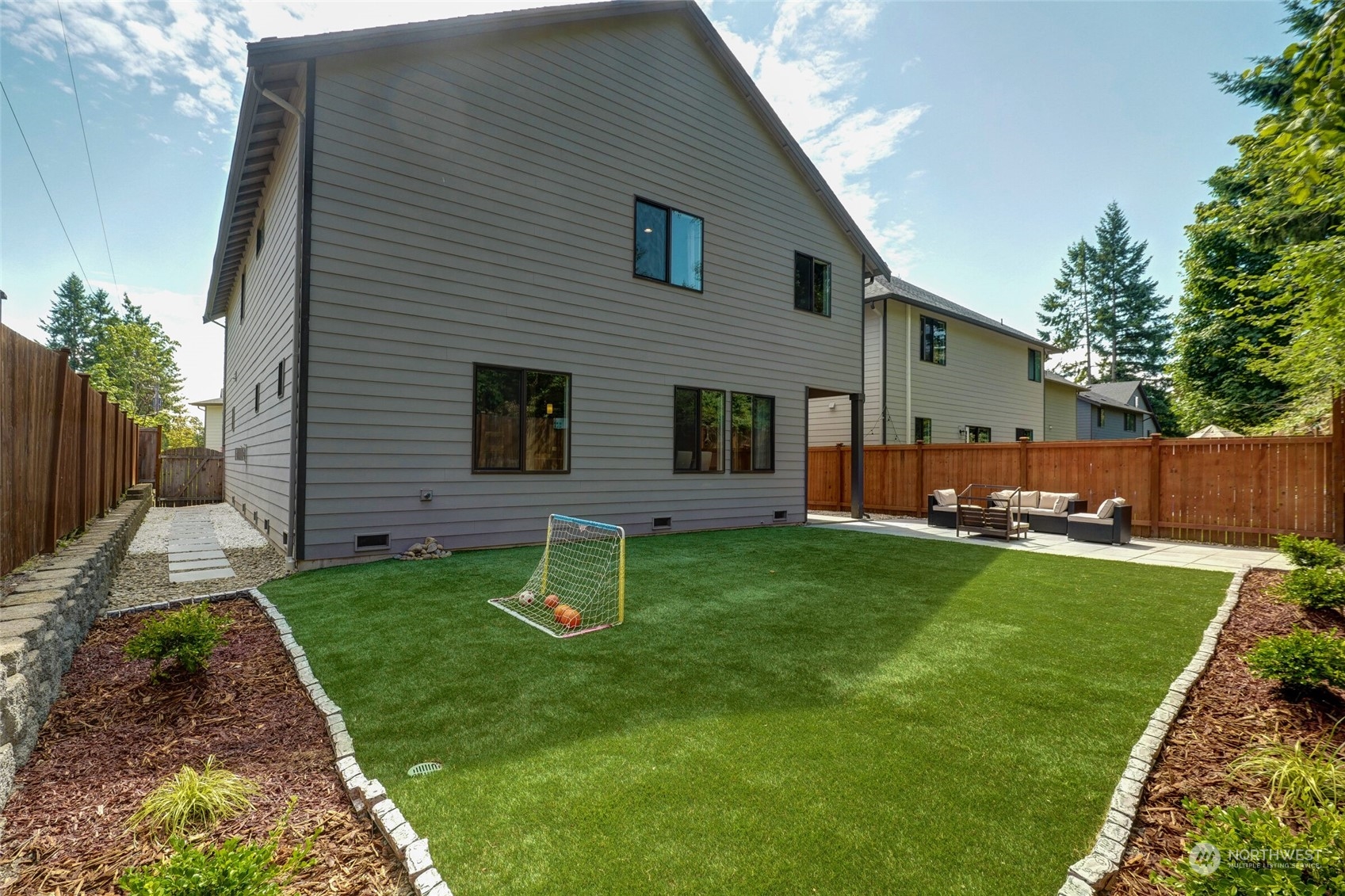 1907 240th Place Southwest Bothell, WA 98021 - Photo 27 of 28 a backyard of a house with lots of green space