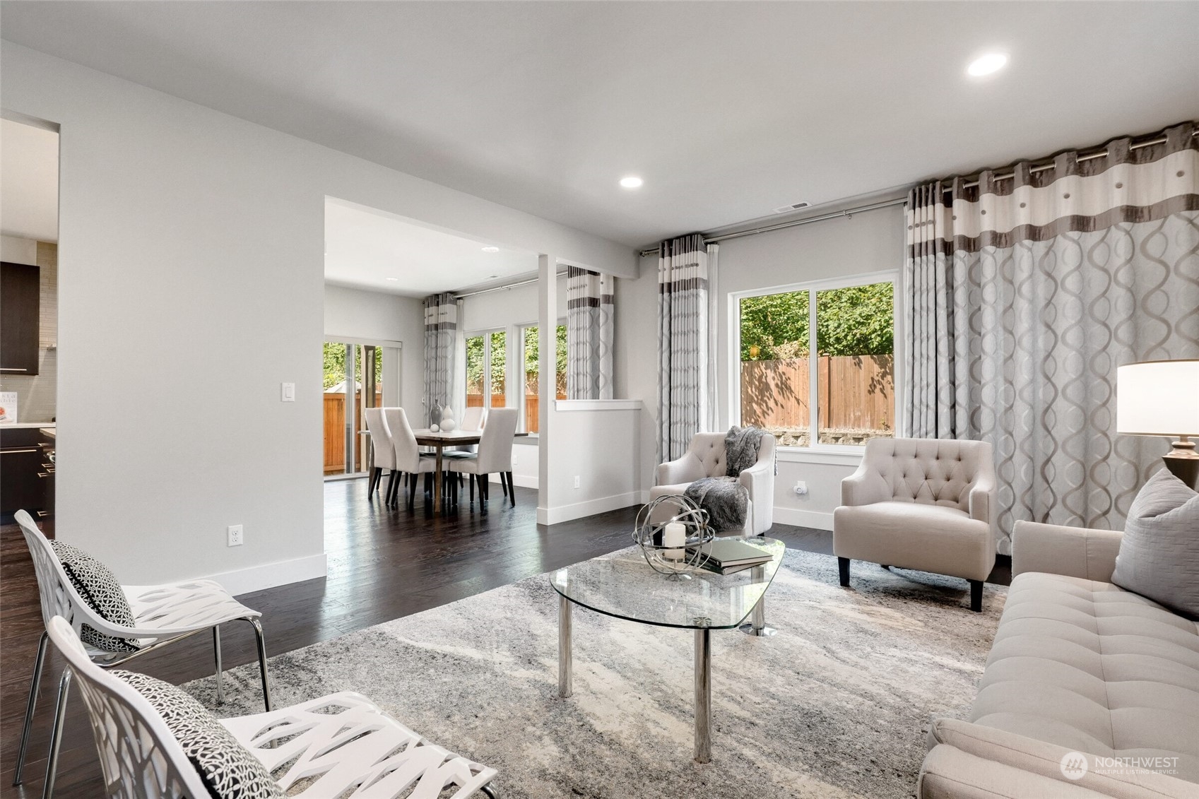 1907 240th Place Southwest Bothell, WA 98021 - Photo 3 of 28 a living room with furniture and a large window