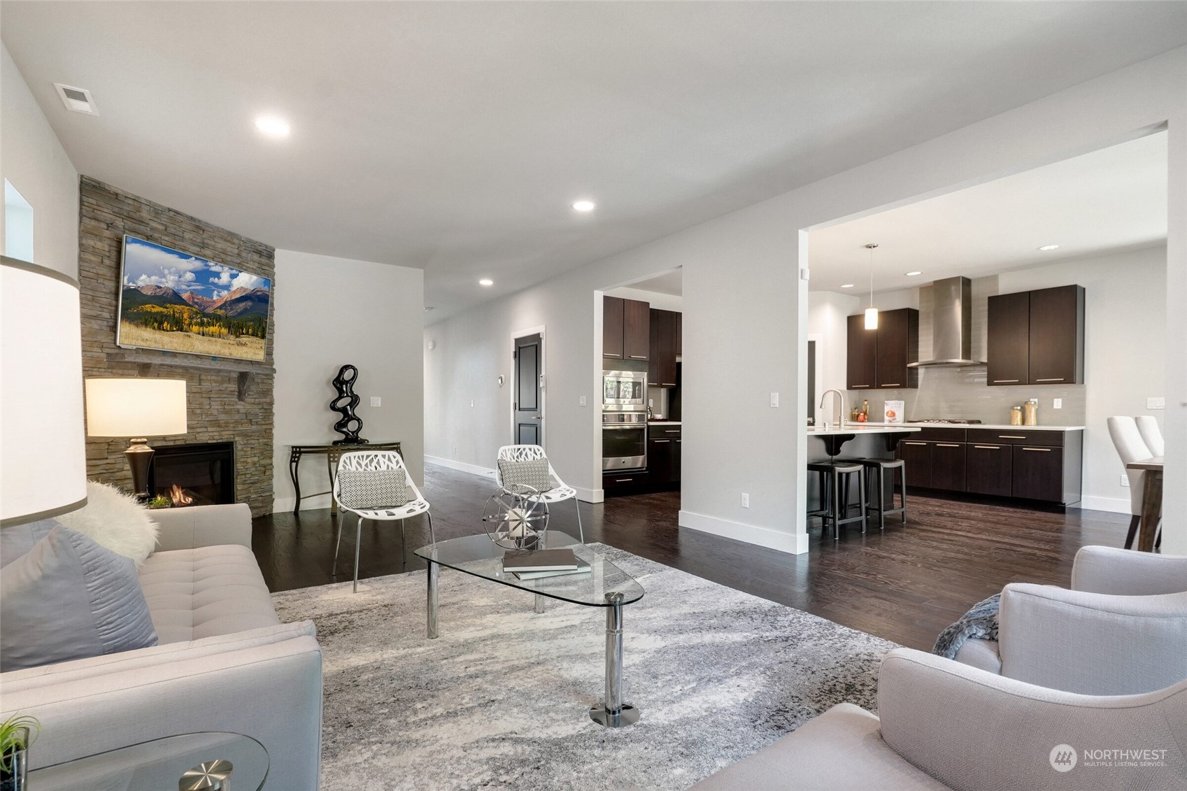 1907 240th Place Southwest Bothell, WA 98021 - Photo 5 of 28 a living room with furniture and kitchen view