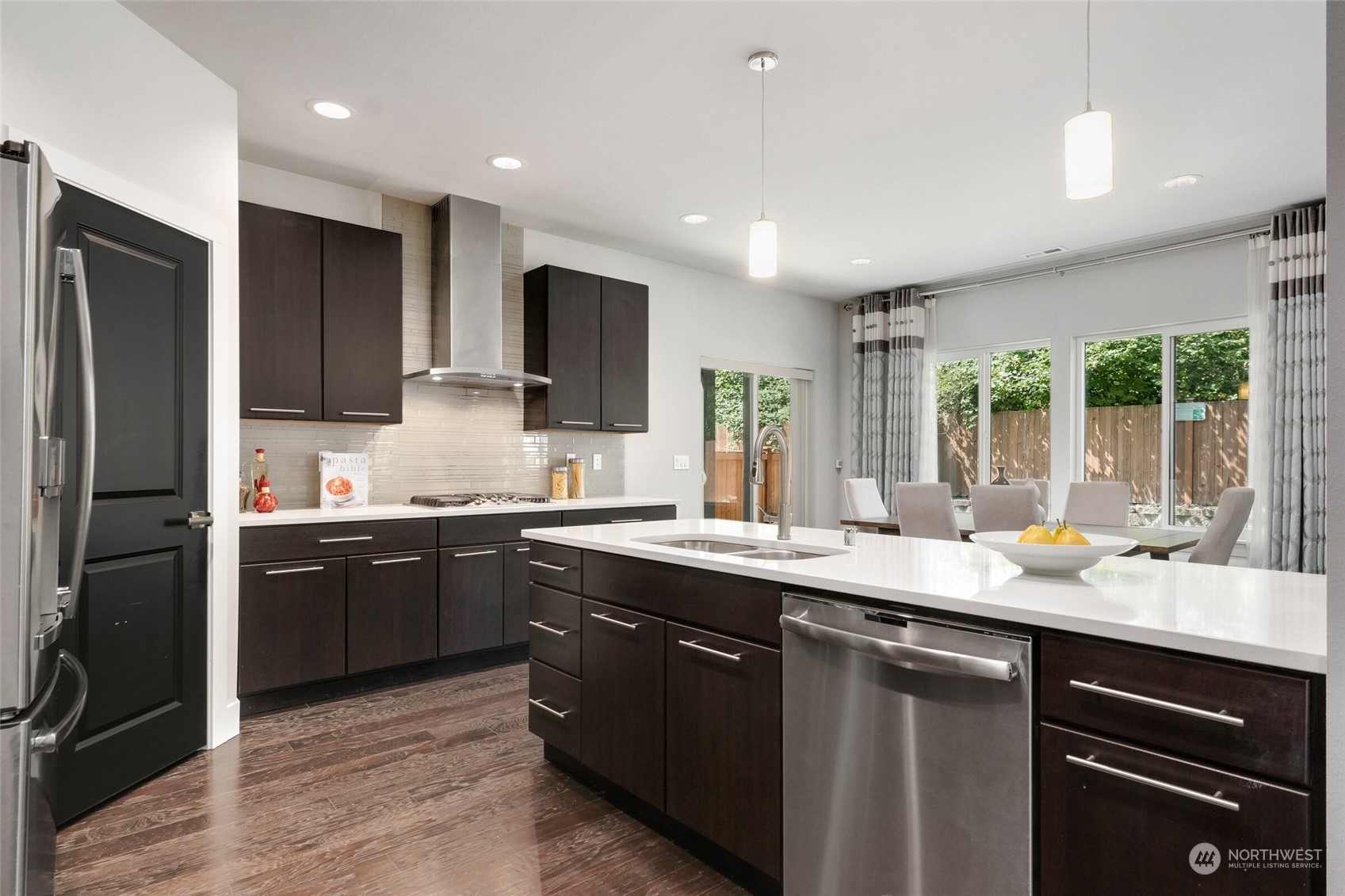 1907 240th Place Southwest Bothell, WA 98021 - Photo 10 of 28 a kitchen with a sink stove and refrigerator