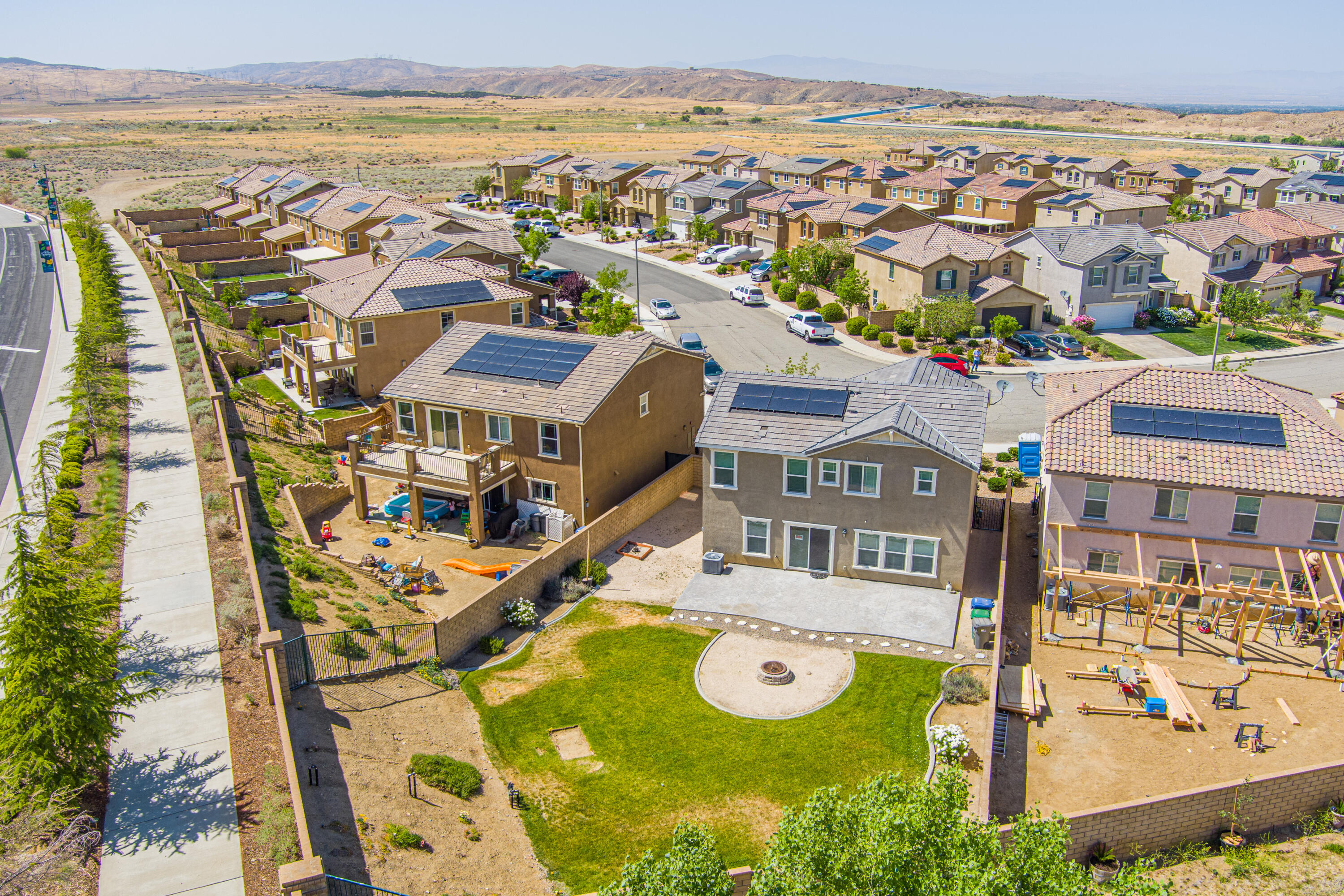 2732 Hemlock Road Palmdale, CA 93551 - Photo 35 of 42 an aerial view of residential houses with outdoor space and ocean view