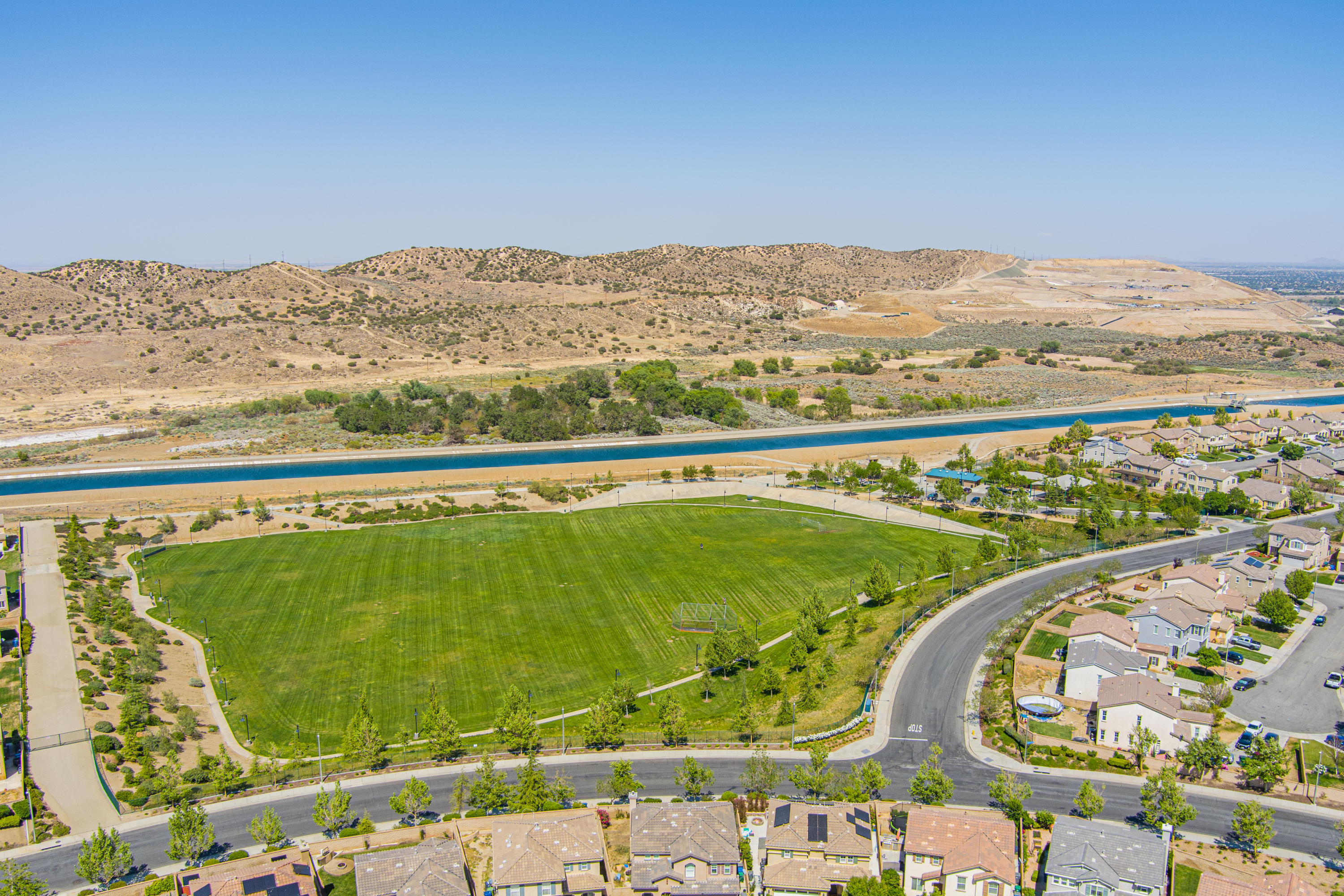 2732 Hemlock Road Palmdale, CA 93551 - Photo 42 of 42 a view of a swimming pool with a lake view