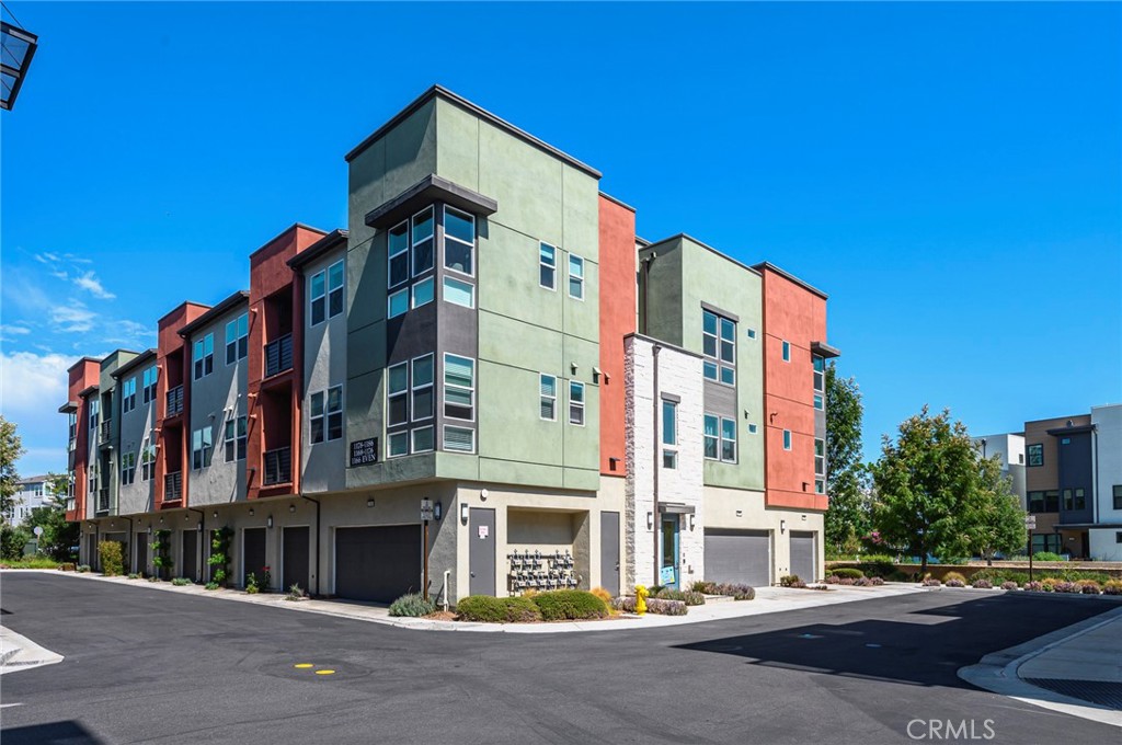 a tall building sitting on the side of a street