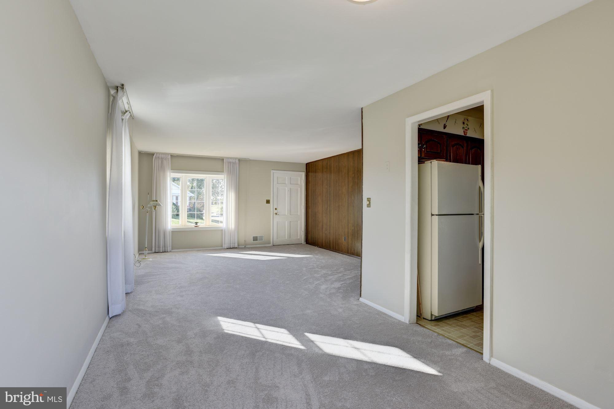 2300 Cider Mill Road Baltimore, MD 21234 - Photo 3 of 30 Living Room | Dining Room | Main Entrance