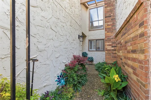 view of a house with a potted plant