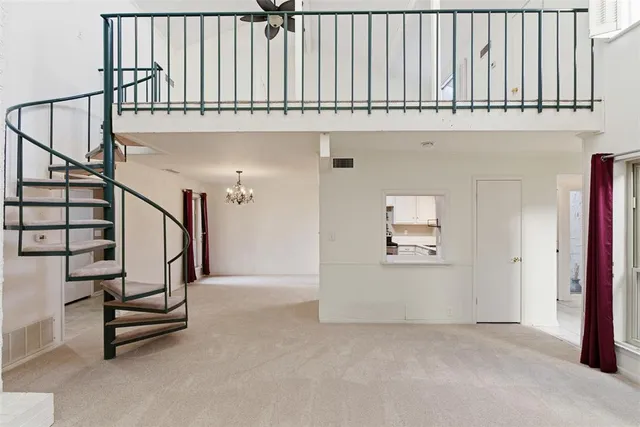 an entryway with a staircase