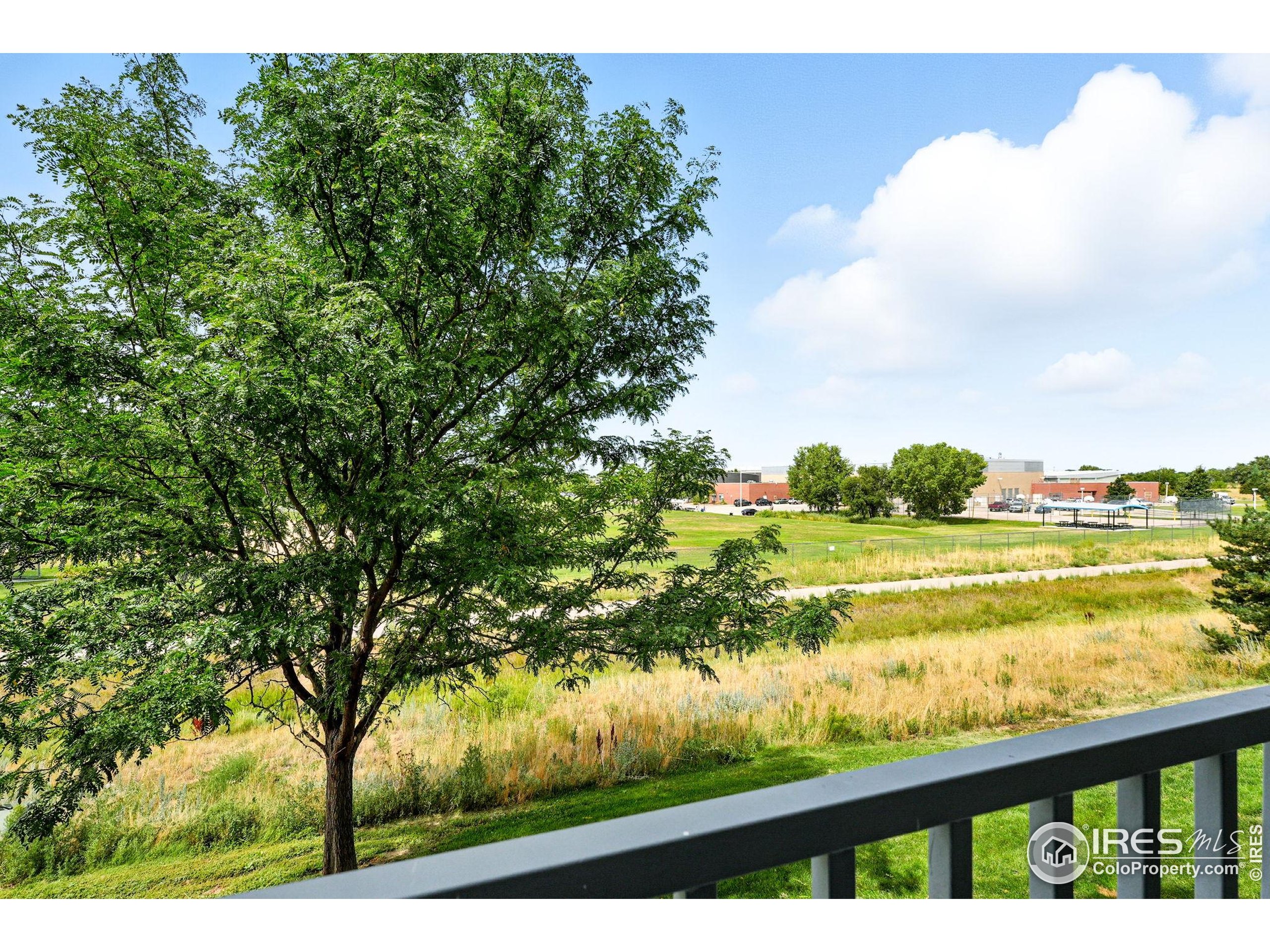 5255 Memphis Street, Unit 312 Denver, CO 80239 - Photo 20 of 44 a view of lake from a balcony