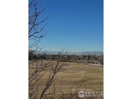 a view of a lake with a big yard