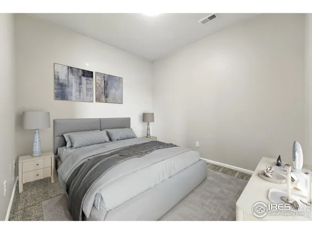 a kitchen with a sink and a refrigerator