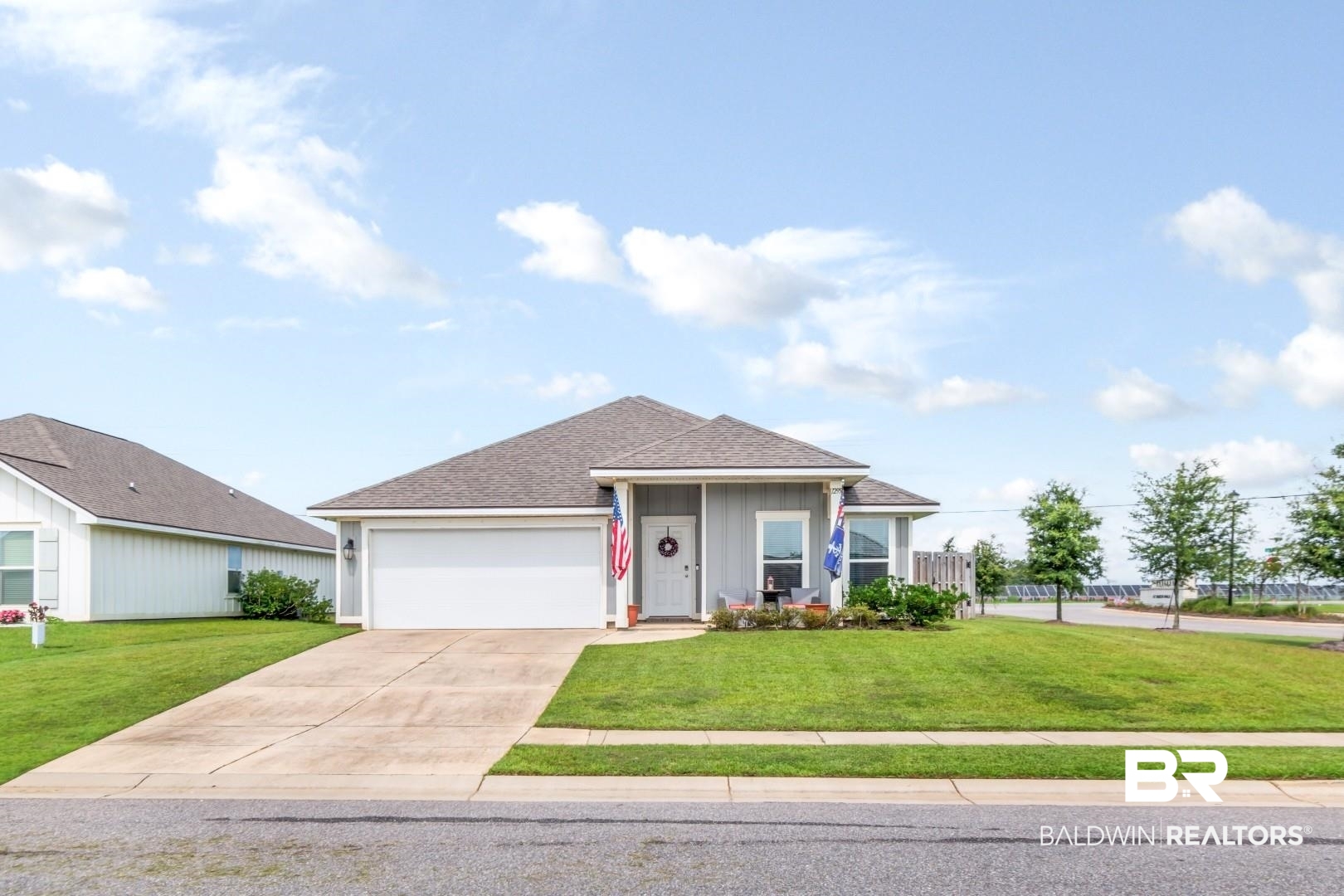 1295 Hayward Loop Foley, AL 36535 - Photo 1 of 29 Single-story residence featuring a gray exterior siding and a dark shingle roof