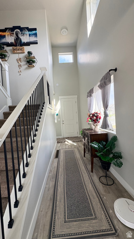 7889 Bristlecone Road Eagle Mountain, UT 84005 - Photo 8 of 42 Foyer with high ceilings and transom windows for abundant illumination