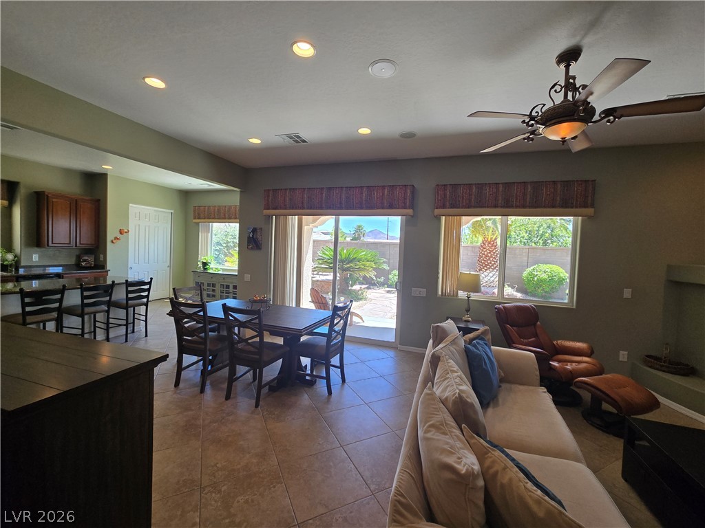 2567 Dirleton Place Henderson, NV 89044 - Photo 53 of 67 An inviting open-concept living area with tiled flooring and ample natural light, ideal for entertaining.