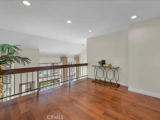 a view of a balcony with city view