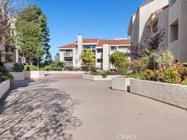 a view of a patio with a table and chairs
