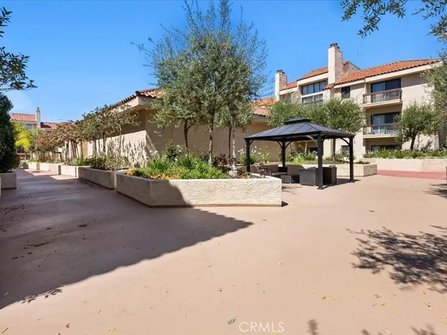 a view of a swimming pool with chairs