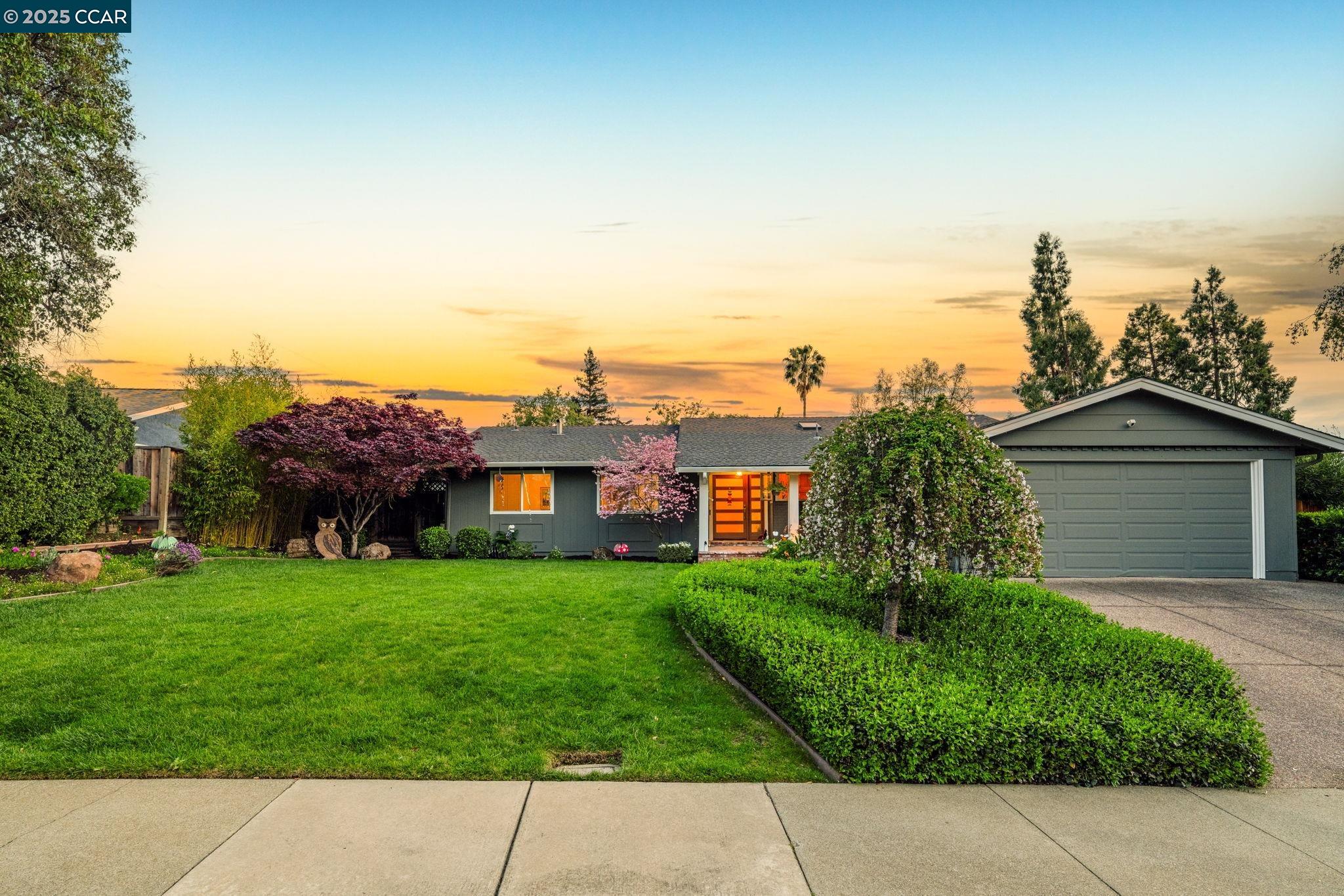 3455 Bayberry Drive Walnut Creek, CA 94598 - Photo 1 of 1 a front view of house with yard and trees