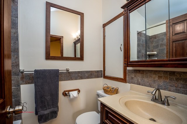 2983 East 1520th Road Ottawa, IL 61350 - Photo 19 of 21 a bathroom with a sink and a mirror