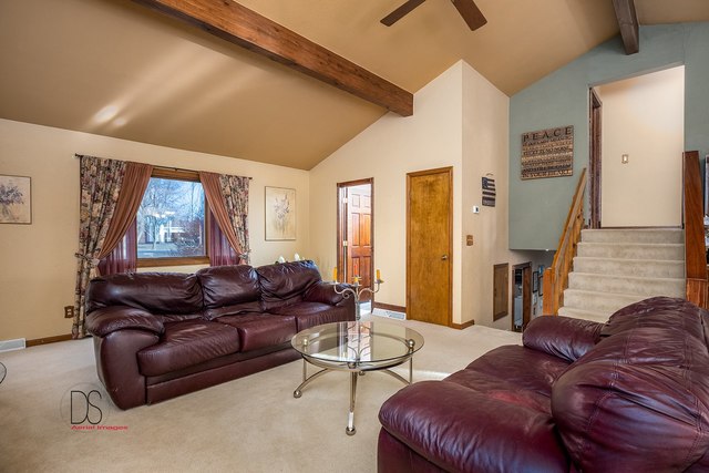 2983 East 1520th Road Ottawa, IL 61350 - Photo 5 of 21 a living room with furniture and a large window