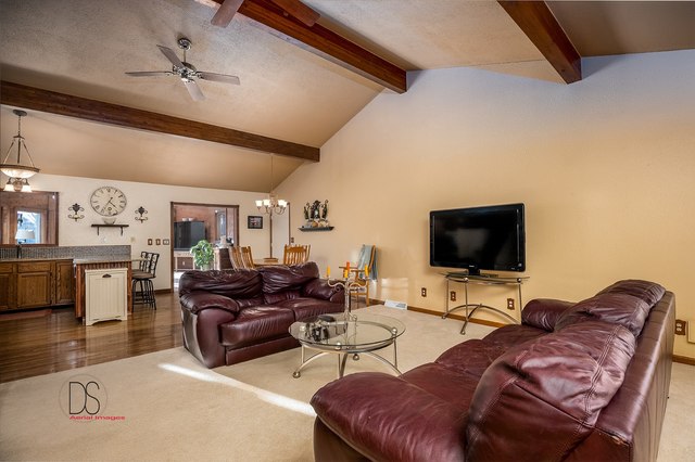 2983 East 1520th Road Ottawa, IL 61350 - Photo 6 of 21 a living room with furniture and a flat screen tv