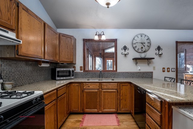 2983 East 1520th Road Ottawa, IL 61350 - Photo 9 of 21 a kitchen with a sink and cabinets