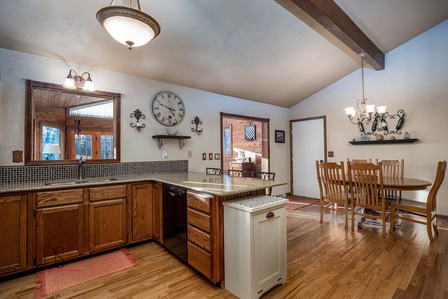 2983 East 1520th Road Ottawa, IL 61350 - Photo 10 of 21 a kitchen with a sink cabinets and wooden floor