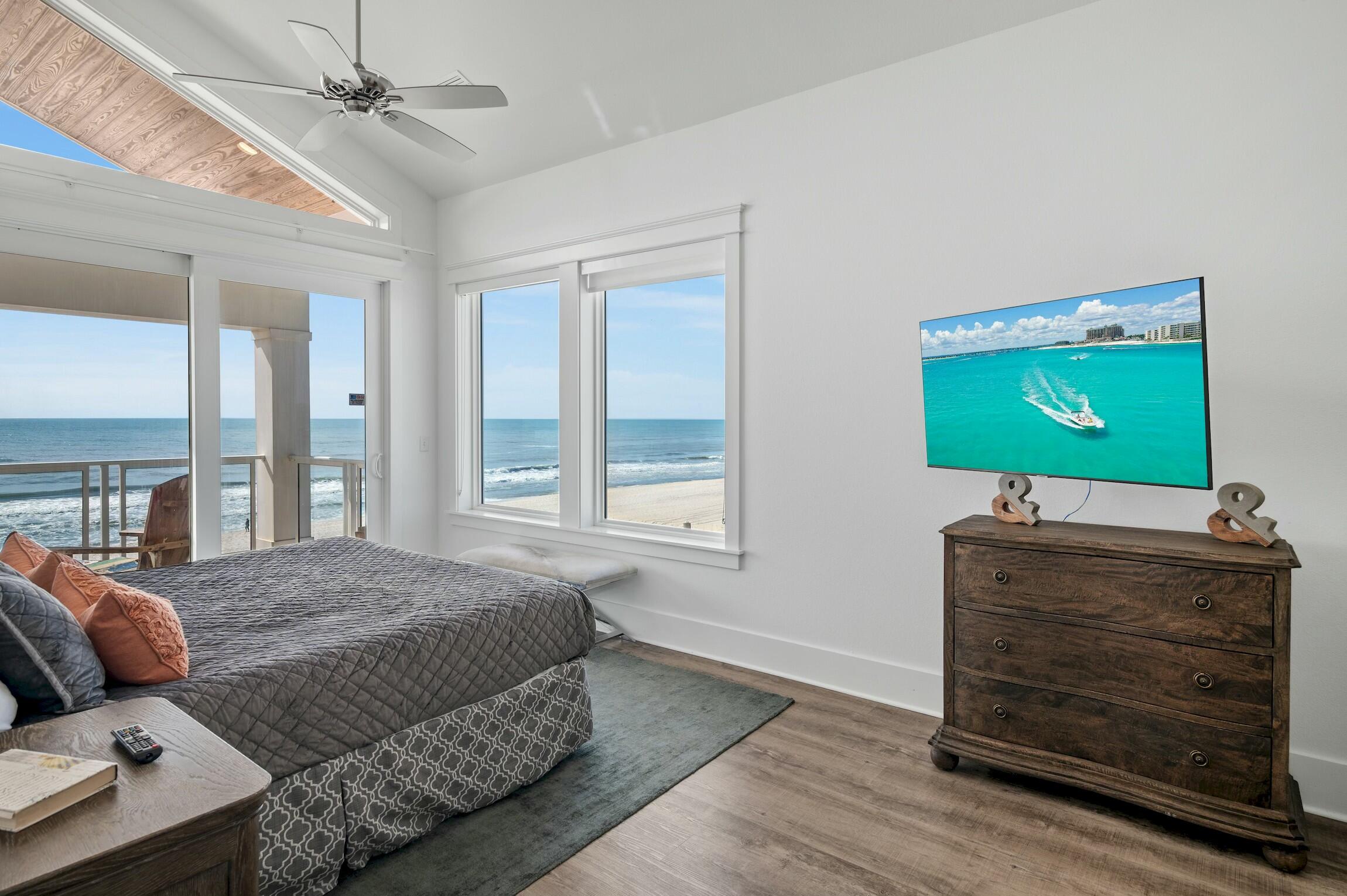 16515 Front Beach Road Panama City Beach, FL 32413 - Photo 39 of 46 a bedroom with a bed and furniture