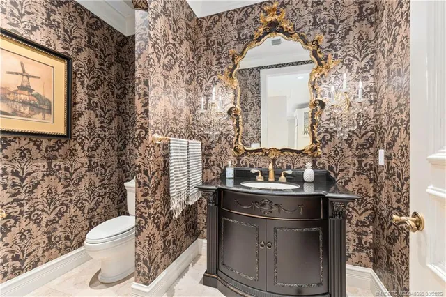 a living room with furniture large window and outdoor view