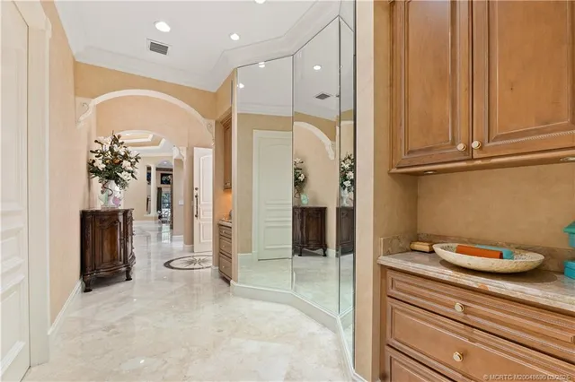 a view of a livingroom with furniture and lounge chair