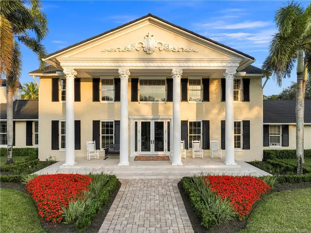 a front view of a house with a porch