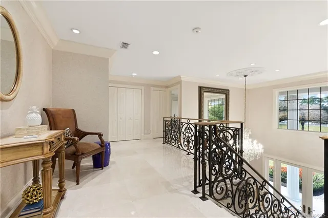 a spacious bathroom with a double vanity sink a mirror and a shower