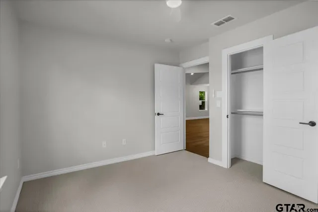 an empty room with an empty space