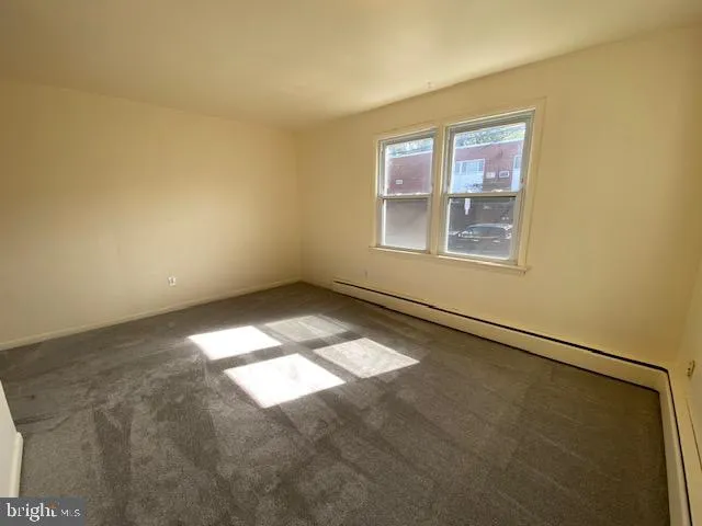 a bathroom with a sink toilet and tub