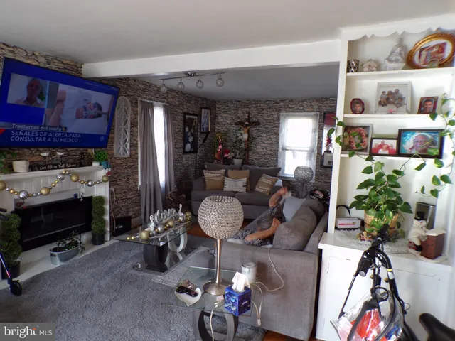 a room with furniture and a fireplace