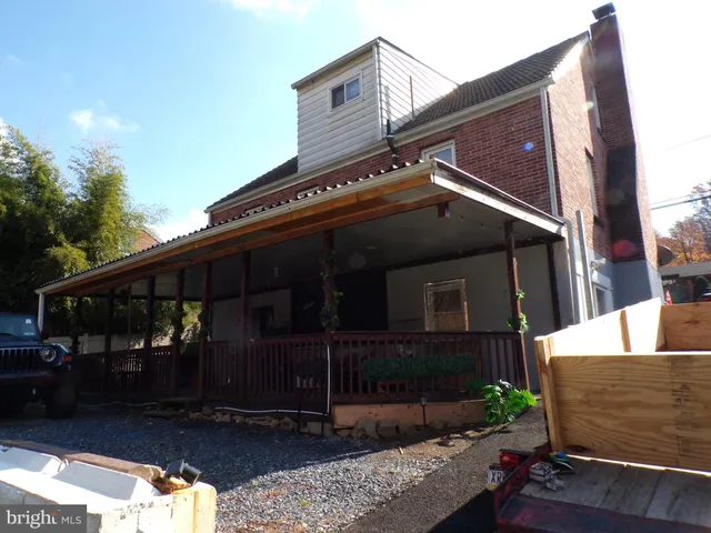 a front view of house with street