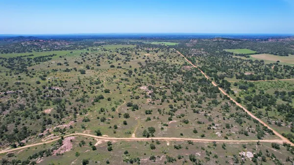 a view of a city with an outdoor space